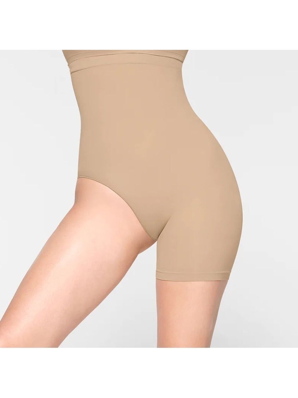 SKIMS Seamless Sculpt Solutions Shorts, Right Leg Exposed